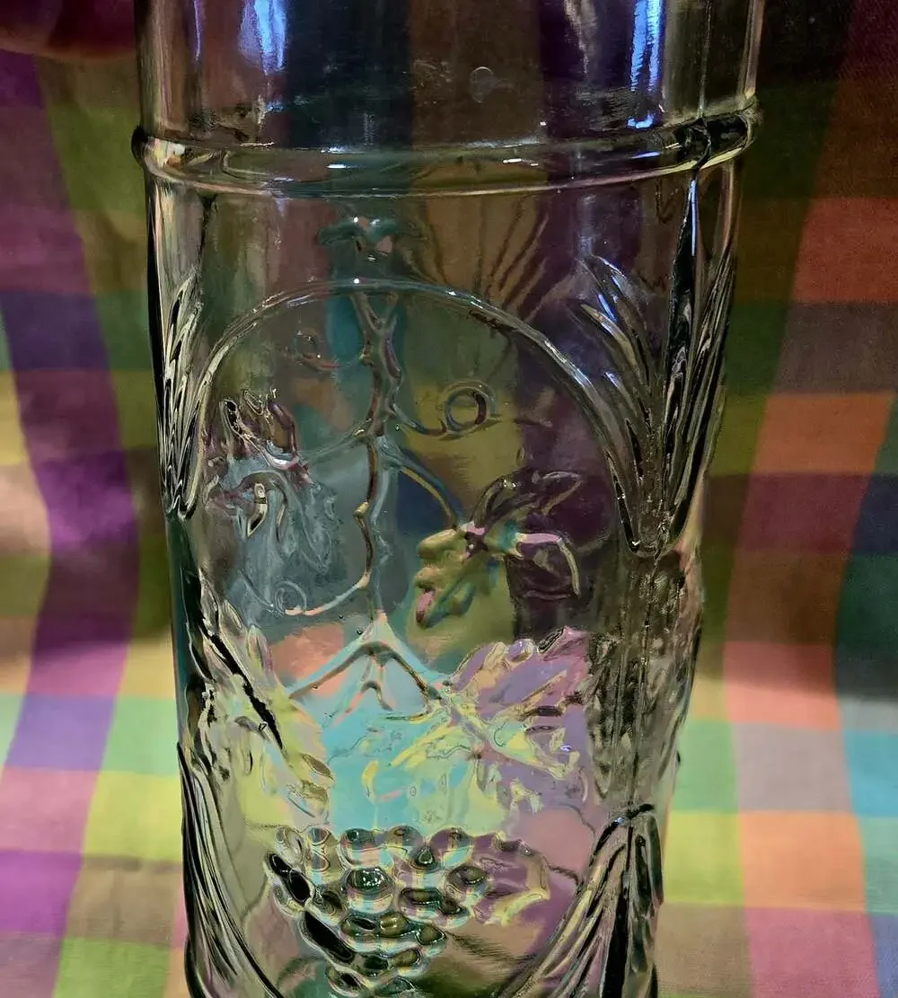Vintage Green Glass Bottle Decanter with Raised Grape and Vine Relief Design
